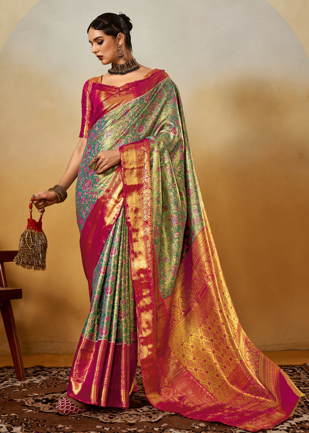 Saga green dual tone Kanjivaram silk saree with brocade blouse and two-tone shimmer