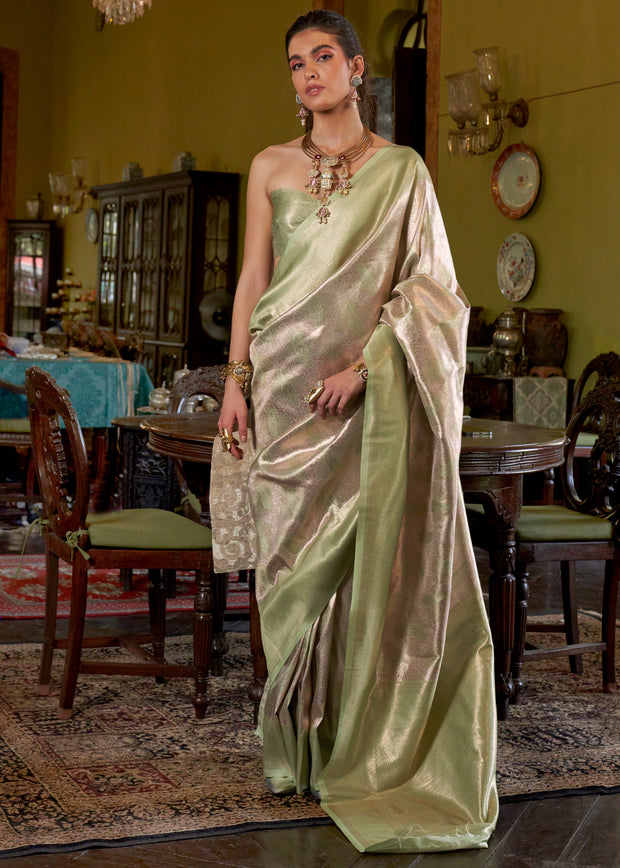 Pista green dual tone Kanjivaram silk saree with pale two-tone woven shimmer
