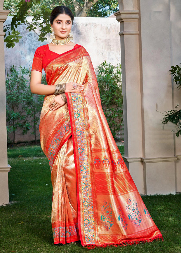 Sunset orange Kanjivaram silk saree with warm gold zari and traditional woven border