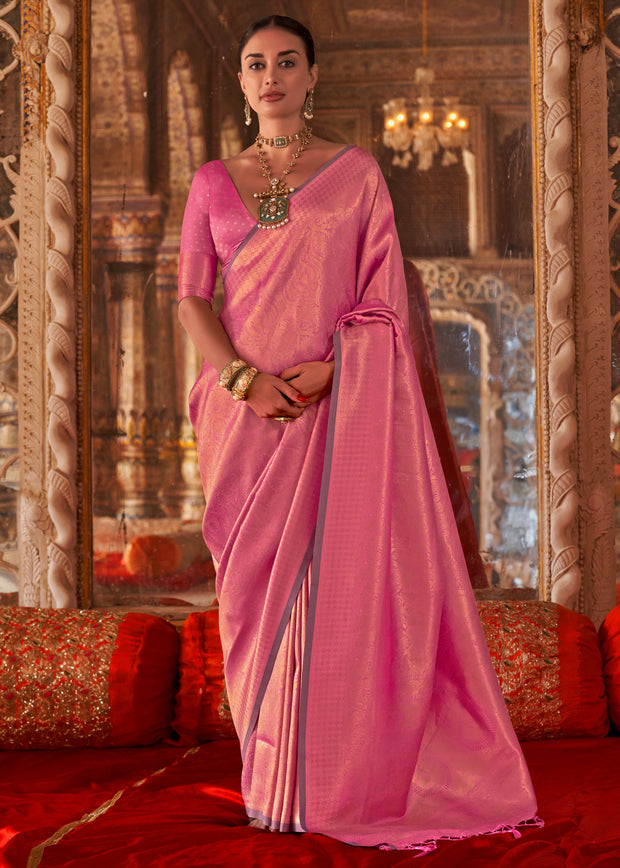 Carnation pink Kanjivaram silk saree with traditional gold zari weaving from Kanchipuram