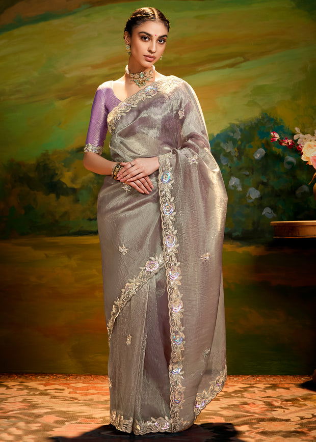Slate grey heavy embroidered silk saree with contrast blouse