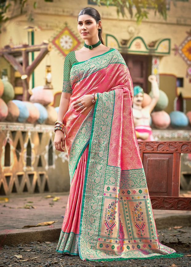 Salmon pink Kanjivaram silk saree with traditional gold zari and woven Kanchipuram border