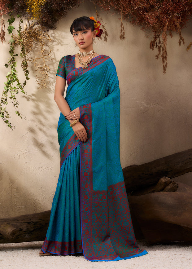 Coral blue Kanjivaram silk saree with striking colour contrast and Kanchipuram weaving