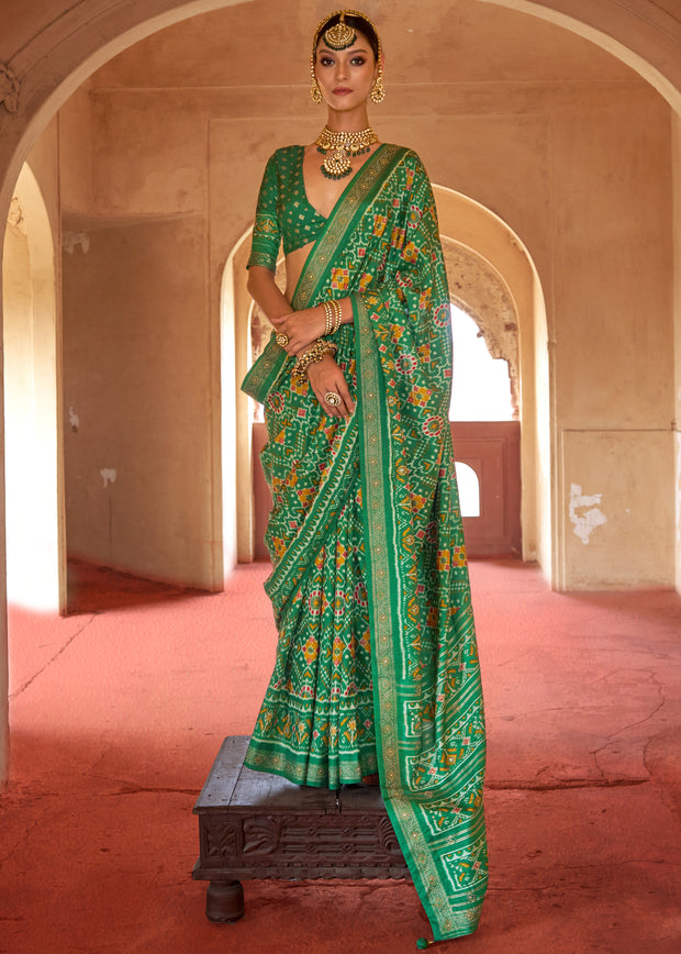 Medium green Patola silk saree with printed geometric heritage pattern