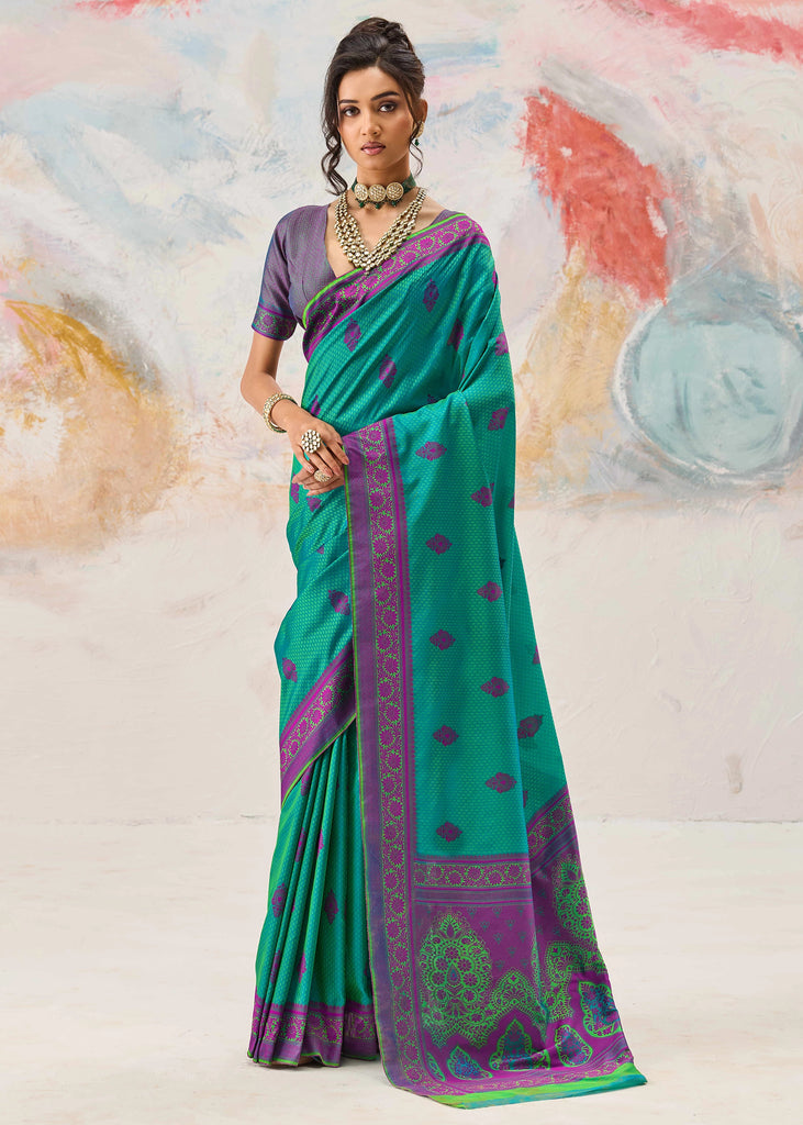Marine green Kanjivaram silk saree with deep colour and traditional Kanchipuram weaving