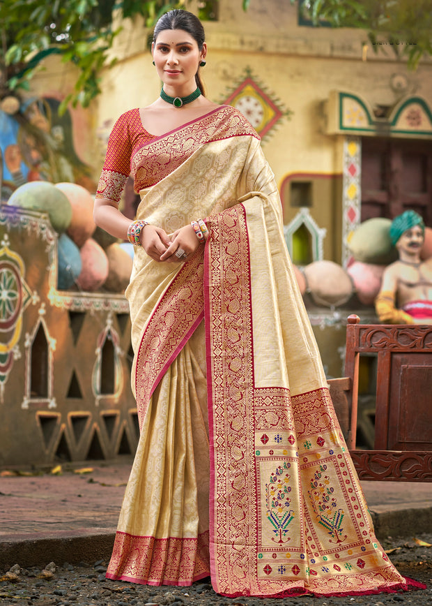 Beige and red Kanjivaram silk saree with contrasting Kanchipuram woven border