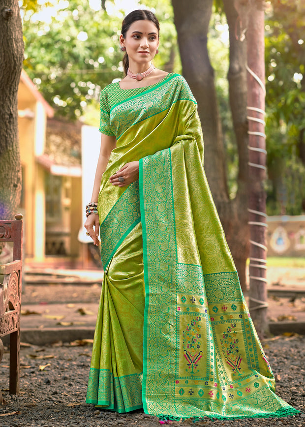 Glow green Kanjivaram silk saree with intricate gold zari and Kanchipuram woven border