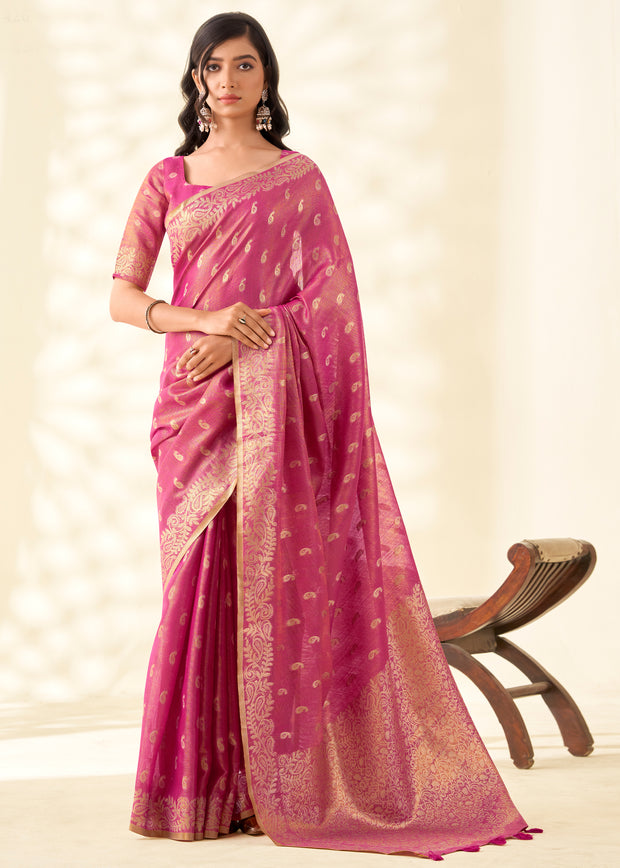 Dusky pink linen tissue silk saree with quiet sheen and airy drape