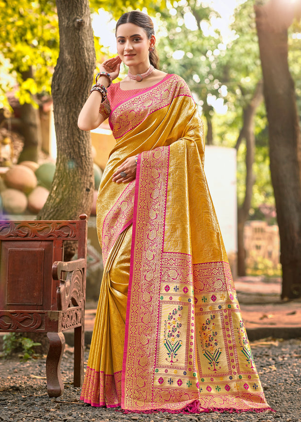 Haldi yellow Kanjivaram silk saree with intricate gold zari and rich woven border