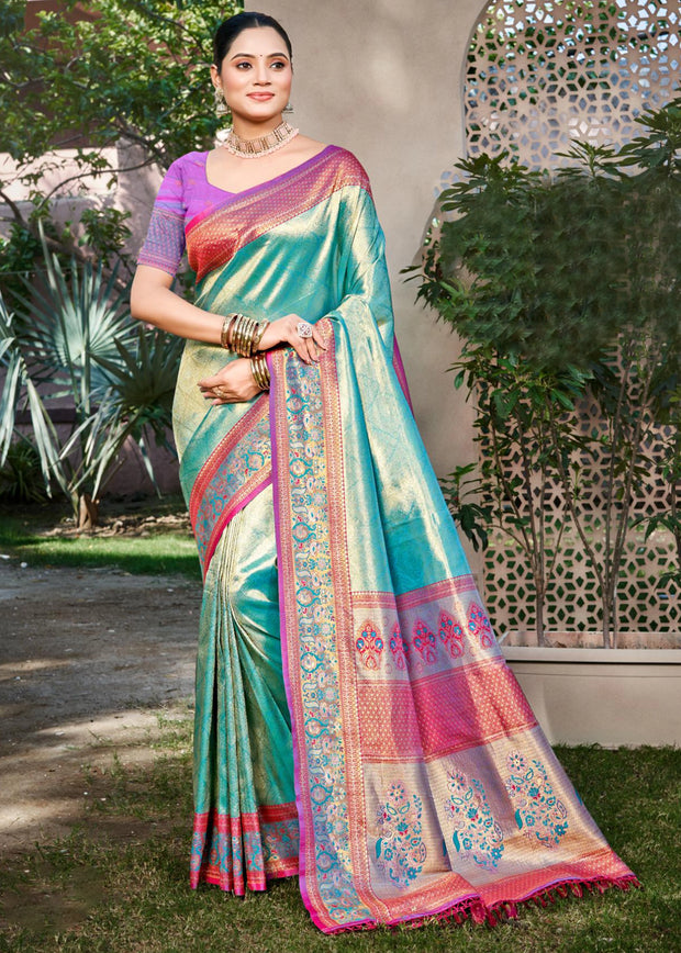 Teal blue Kanjivaram silk saree with gold zari motifs and Kanchipuram woven border