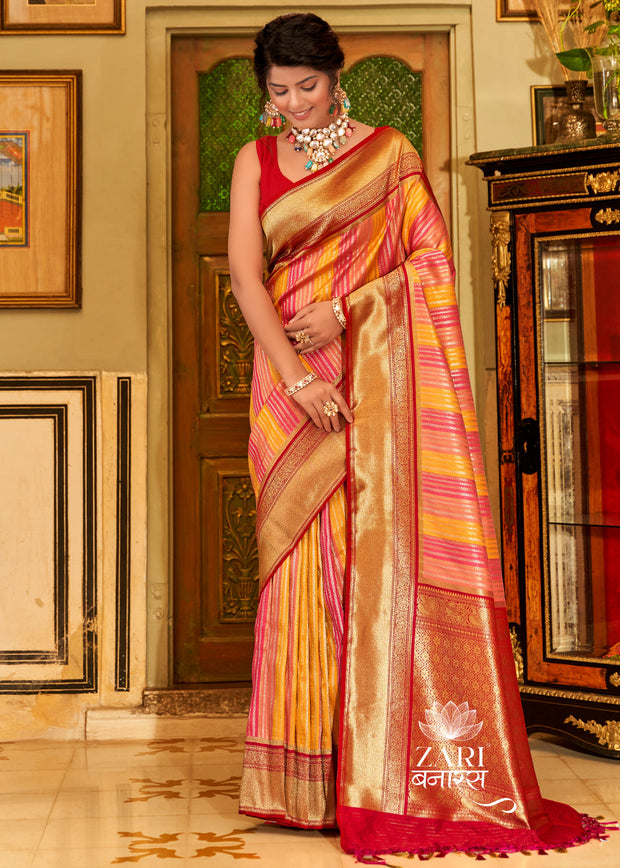 Roohi pink and yellow Kanjivaram silk saree with alternating gold and silver zari stripes