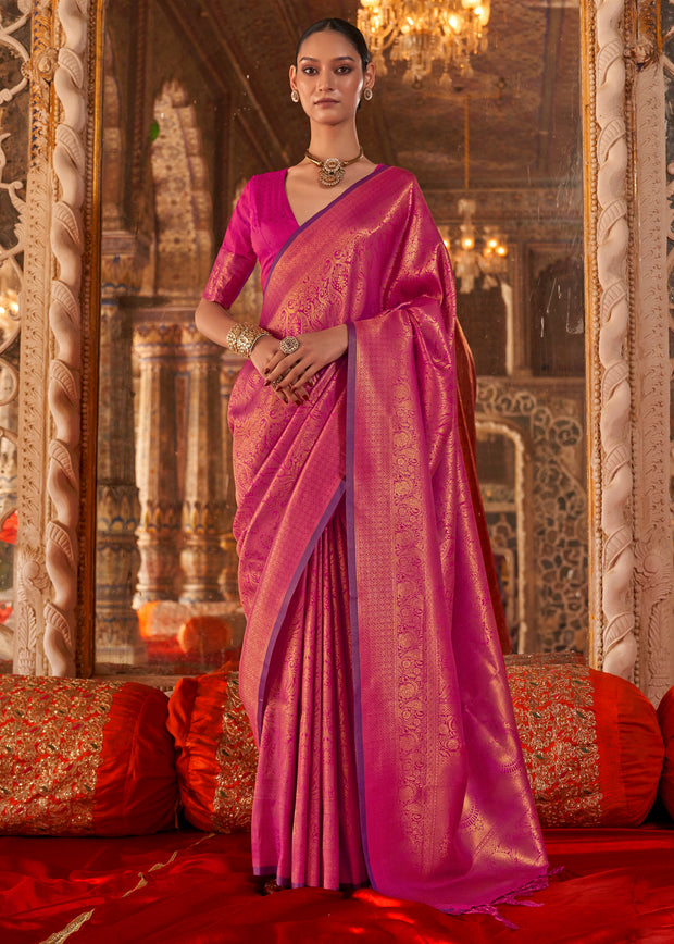 Fuchsia pink Kanjivaram silk saree with traditional gold zari weaving