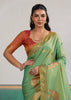 Grass Green Woven Silk Saree With Contrast Blouse