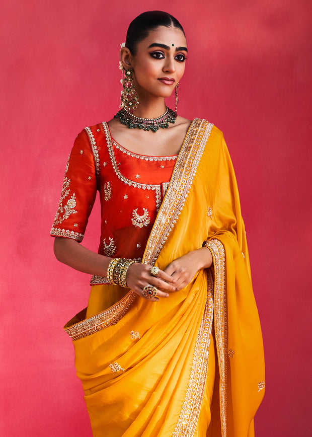 Vibrant Yellow Embroidered Soft Silk Saree With Contrast Blouse