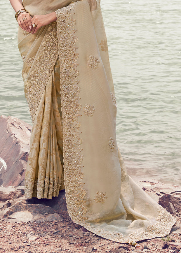 Elegance Ivory Woven Embroidered Tissue Silk Saree