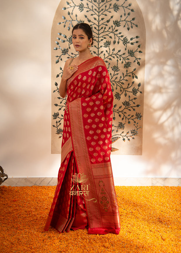 Qainaat red Banarasi Katan silk saree with contrast brocade border and zari weaving