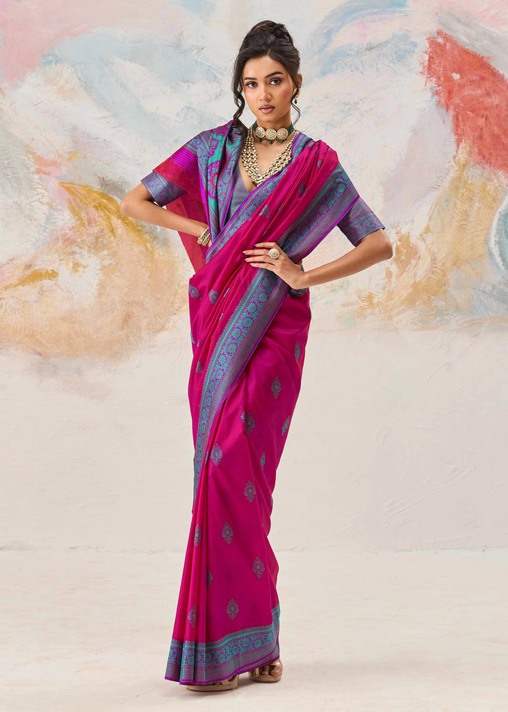 Magenta pink Kanjivaram silk saree with traditional Kanchipuram weaving and vivid colour