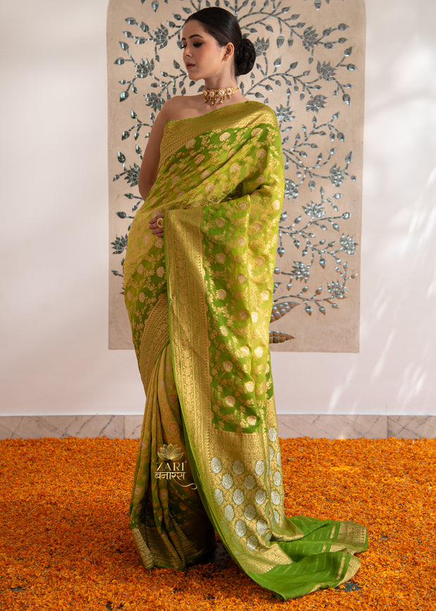 Nitya green Khaddi Georgette handloom Banarasi saree with woven zari motifs