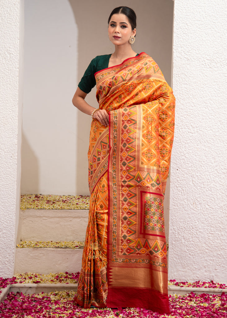 Inaya : Orange Ikat Patan Patola Banarasi Saree with Brocade Border