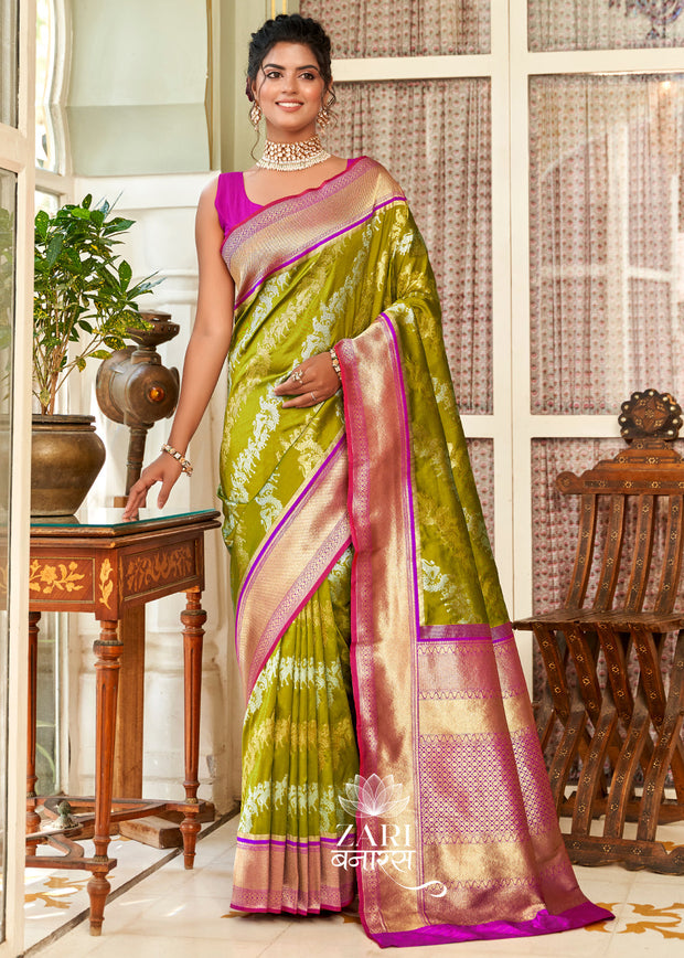 Prakriti green and pink Kanjivaram silk saree with gold zari Leheriya wave pattern