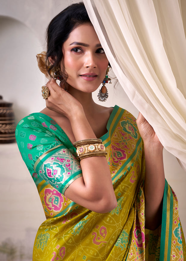 Mehndi Green Woven Patola Silk Saree