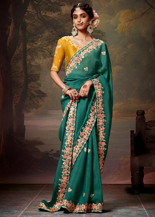 Teal green heavy embroidered designer silk saree with rich embellishments