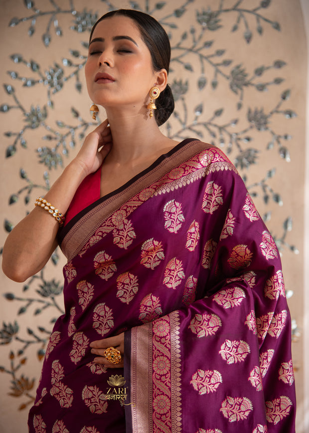 Tejasvi purple Banarasi Katan silk saree with handwoven zari motifs from Varanasi