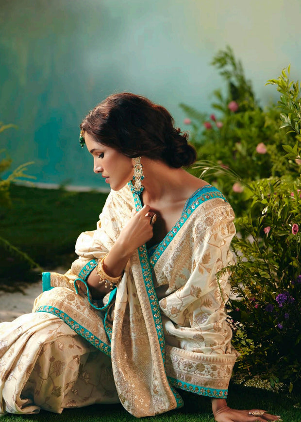Creamy White Woven Embroidered Banarasi Silk Saree