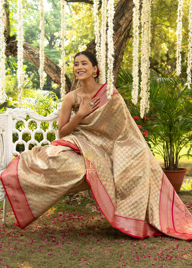 Madhavi beige Banarasi tissue saree with Meenakari resham butis on tissue silk