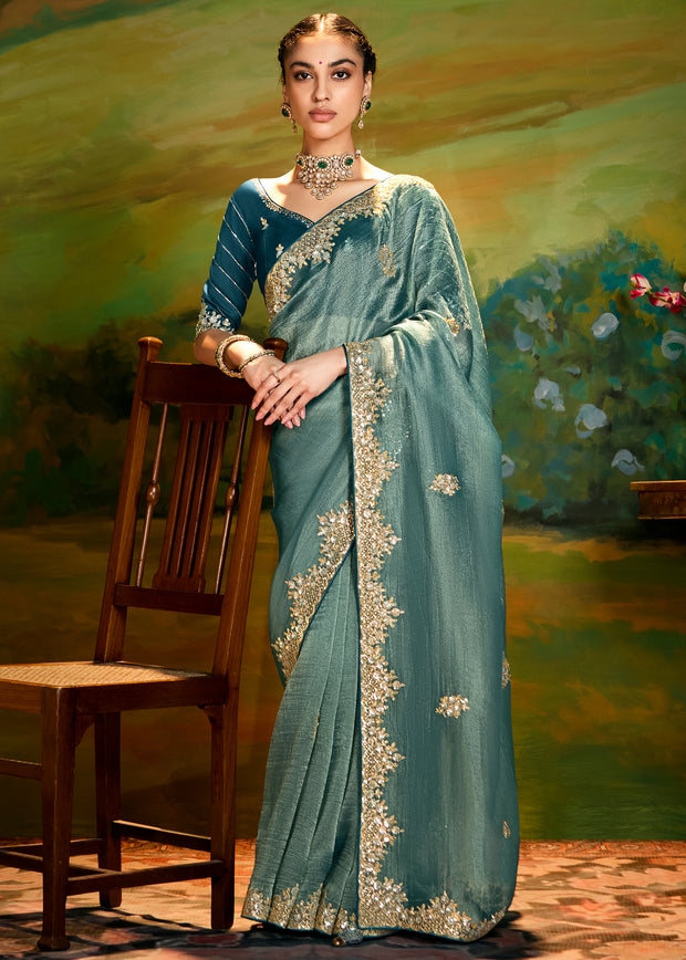 Storm blue heavy embroidered silk saree with contrast blouse