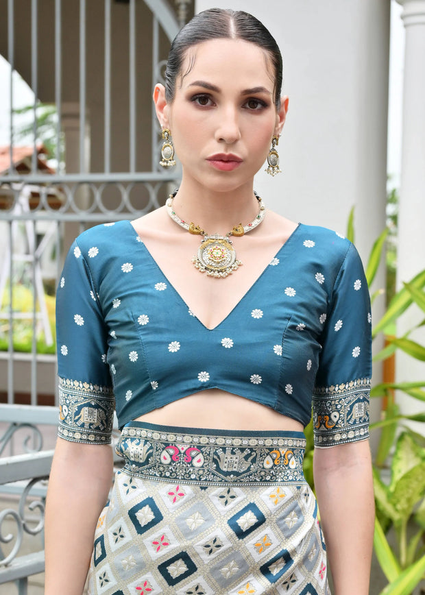 White & Rama Blue Woven Banarasi Patola Silk Saree