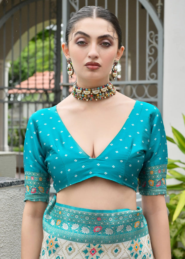 White & Sea Green Woven Banarasi Patola Silk Saree
