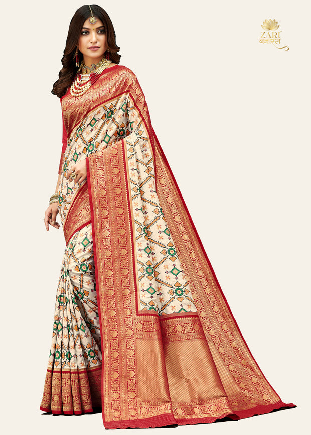 Star white Patola silk saree with double-ikat geometric woven motifs from Patan