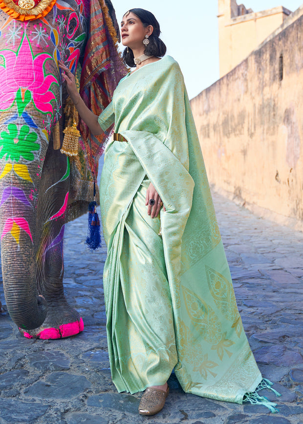 Royal green Kanjivaram silk saree with traditional gold zari weaving