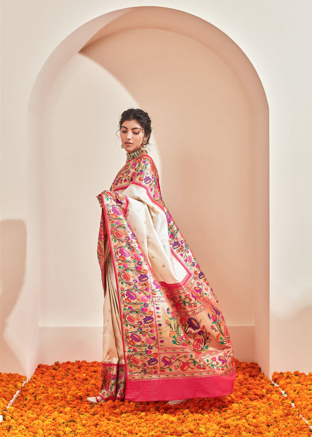 Kamalya white Paithani silk saree with handwoven lotus motif border and zari pallu
