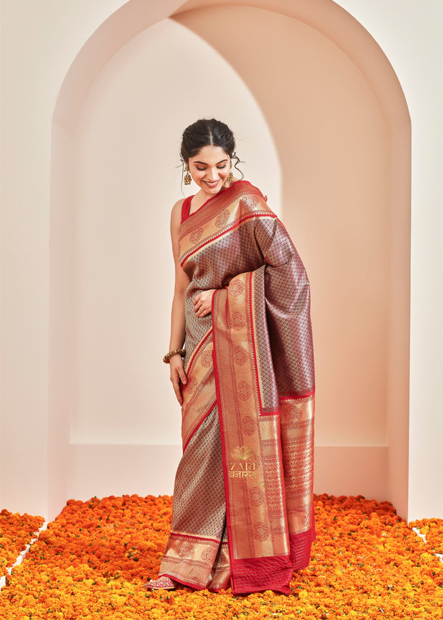 Kanakam purple and red Kanjivaram silk saree with Kadhwa weave motifs from Kanchipuram