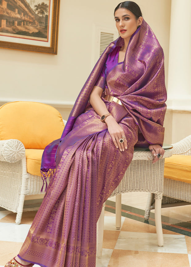 Plum violet Kanjivaram silk saree with traditional gold zari weave