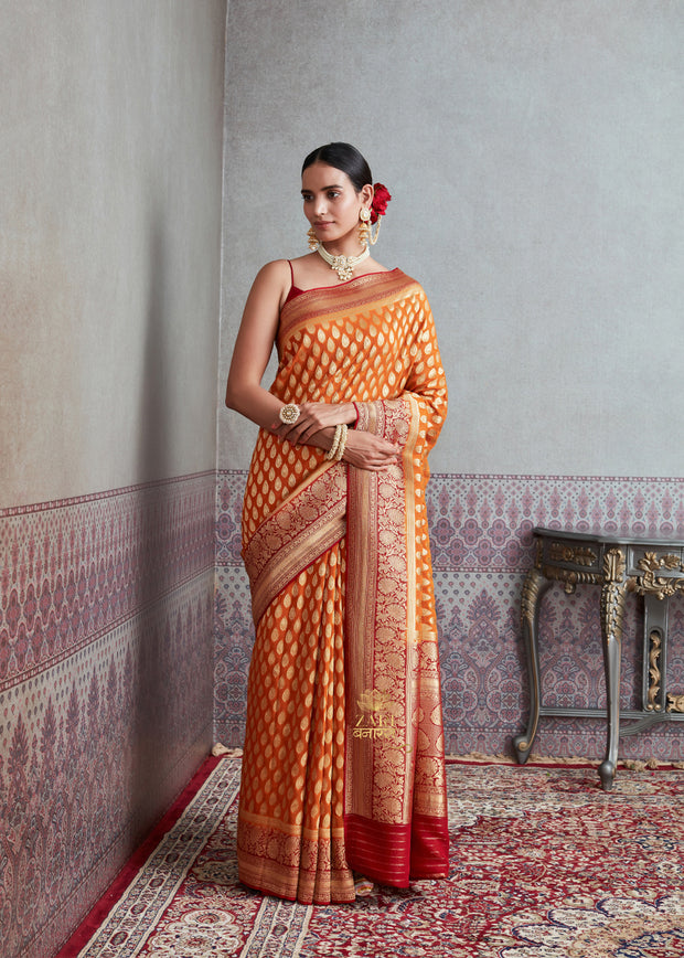 MEENA : BANARASI KHADDI GEORGETTE SAREE IN THE SHADE OF CANARY ORANGE (6891547787457)