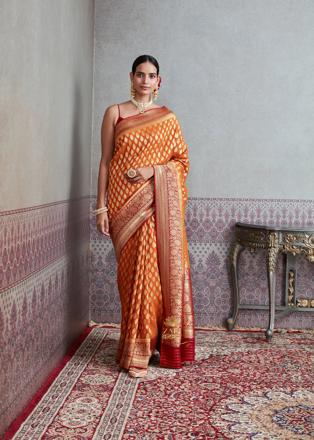 MEENA : BANARASI KHADDI GEORGETTE SAREE IN THE SHADE OF CANARY ORANGE (6891547787457)