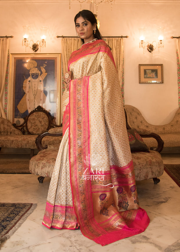 Shakti ivory and pink Banarasi brocade saree with Mughal buta motifs in gold zari
